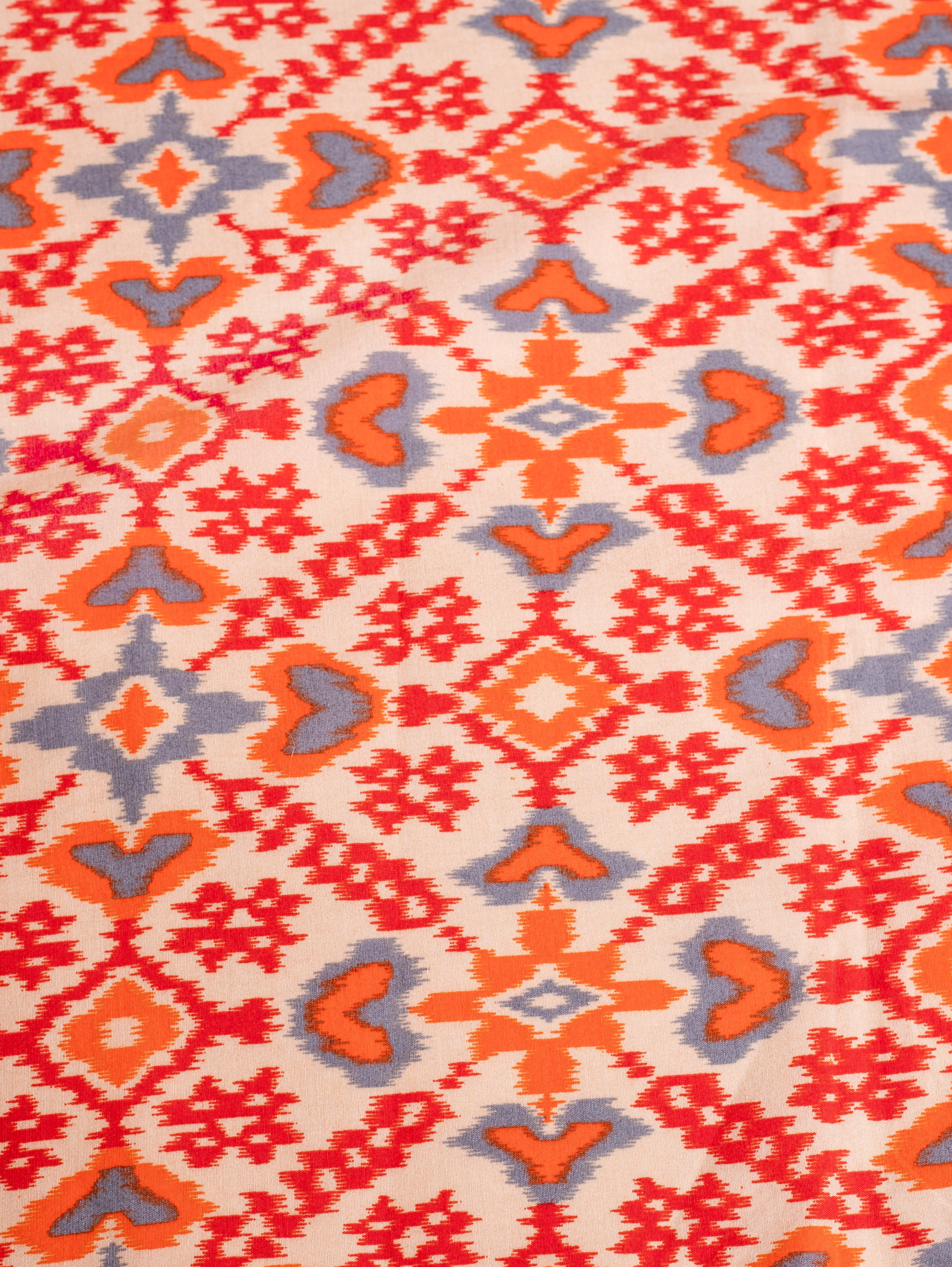 Roze Off-White and Orange Muslin Fabric with Ikkat Print